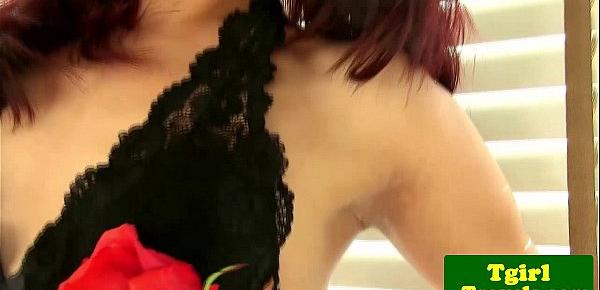  Ladyboy Ning in corset shows tight ass